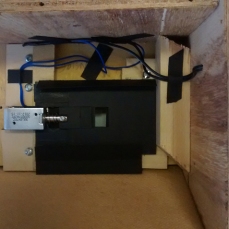 Image shows version MarkVI.3 (2016) which replaced the homemade LDR circuit with a twilight switch, solenoid and solar power. Again housed in a nestbox. Copyright Anthony Carr
